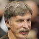 Illustration for article titled What Is That Thing On Stan Kroenke's Head?